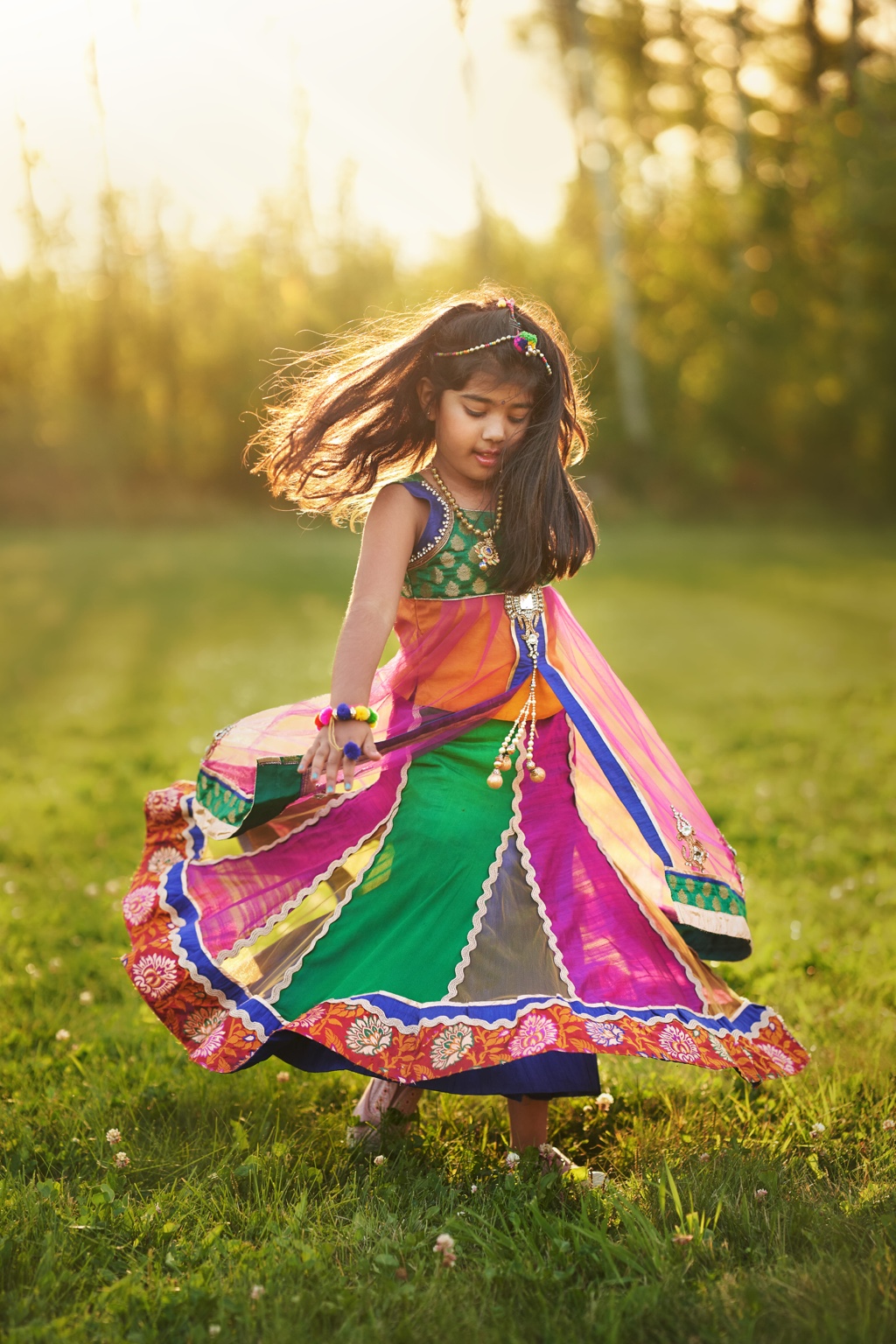 Young child celebrating culture outdoors in Fort McMurray Wood Buffalo